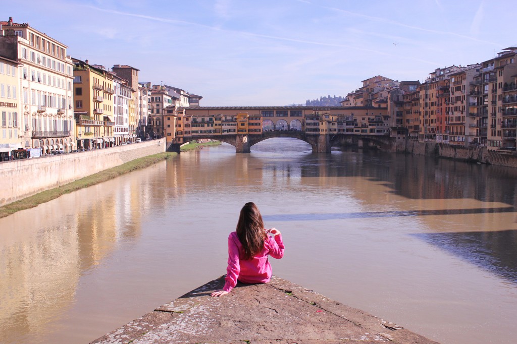 Ponte alla Carraia looking at Ponte Vecchio, kissing in Florence